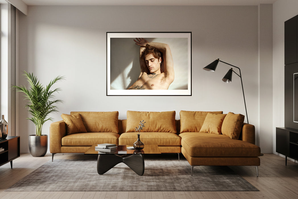 Afternoon light portrait of a man fine art print in a living room wall
