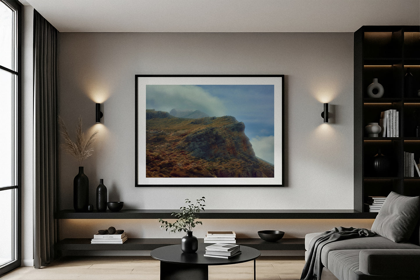 Modern living room with a landscape fine art print by lucas castro pardo on the wall.
