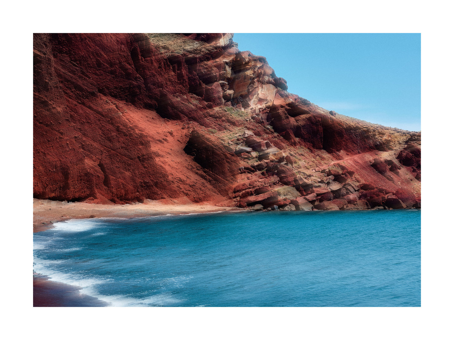 Red cliffside with a blue ocean fine art print 18x24 inches