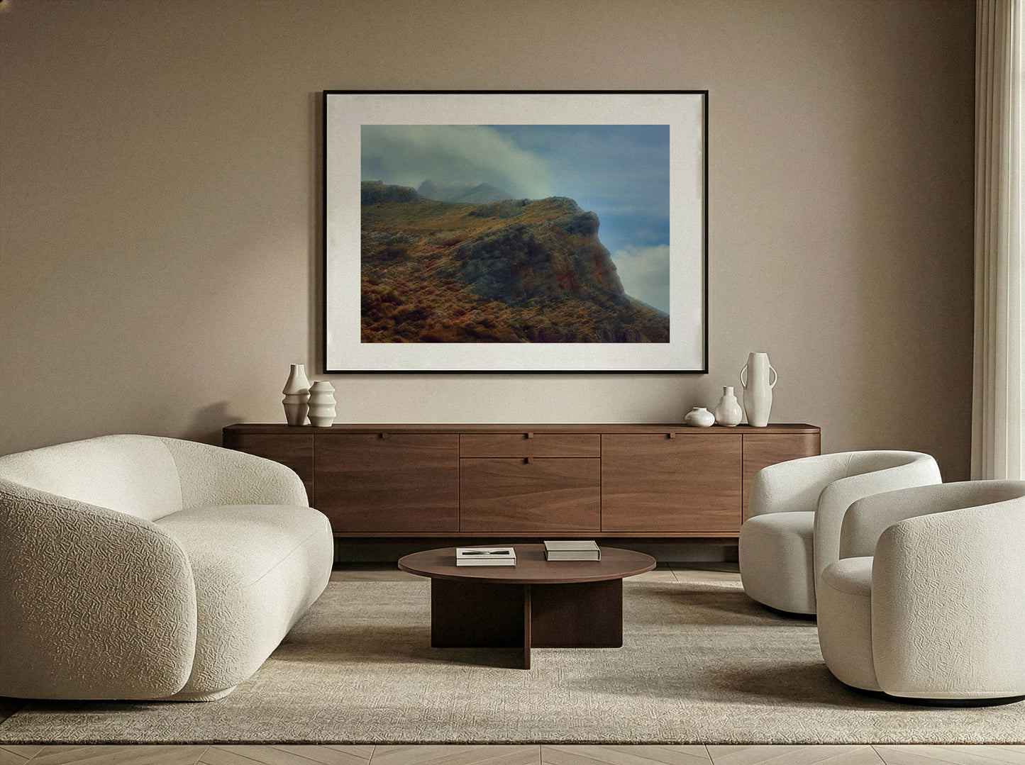 Modern living room with beige sofa, wooden cabinet, and framed artwork on the wall.
