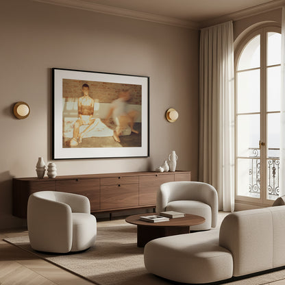 Modern living room with beige sofa, armchairs, and wooden cabinet and framed contemporary fine art photography